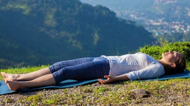 The Savasana also known as the corpse pose helps improve our overall health