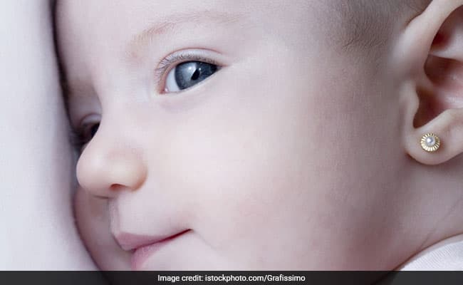 When a baby is just a few days old, it is traditional practice to get the ears pierced