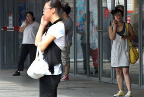 China nearing billion-mark in mobile phone users