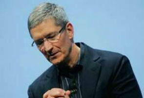 New Apple CEO Cook mourns loss of 'visionary' Jobs