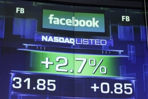 Facebook stock climbs, but company faces lawsuits
