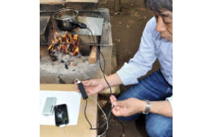 Japan gadget charges cellphone over campfire