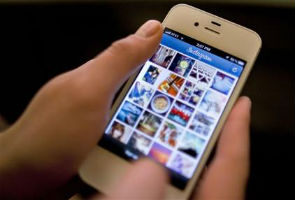 Instagram users fret about Facebook's reach
