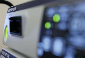 Scandal-hit Olympus unveils new devices to rebuild firm