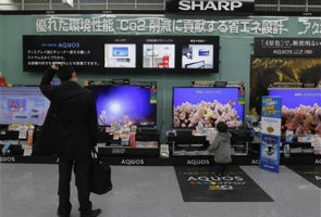 Foxconn owner buying 10 percent stake in Sharp