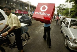 Vodafone to buy out Indian partner for $5B
