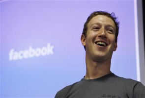 Flaw exposes Facebook CEO's photos of puppy, food