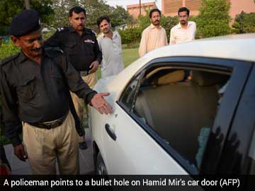 hamid-mir-car-attack-afp-caption-360.jpg