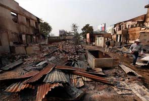 myanmar_riots_houses_broken_295jpg.jpg