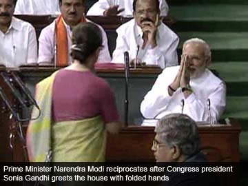 sonia_gandhi_greets_modi_LS_with_caption_360.jpg