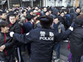 Riot over arrival of new iPhones at Apple store in Beijing